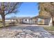 Home exterior with a covered porch, carport, and well-maintained yard at 8989 E Cherokee Dr, Canton, GA 30115