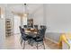 Elegant dining area featuring a decorative chandelier and ample seating at 951 Orchard Mill Ln, Lawrenceville, GA 30043