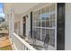 Inviting front porch with seating, offering a cozy outdoor space at 951 Orchard Mill Ln, Lawrenceville, GA 30043