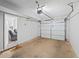 Spacious garage featuring an automatic door and interior access at 951 Orchard Mill Ln, Lawrenceville, GA 30043
