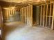 Unfinished basement showcasing framing, stairs, and a blank canvas ready for your personalized design and finishing touches at 108 Deer Xing, Temple, GA 30179