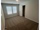 Inviting bedroom with carpet flooring and great natural light at 108 Deer Xing, Temple, GA 30179