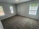Bright bedroom with plush carpeting and natural light from multiple windows at 108 Deer Xing, Temple, GA 30179
