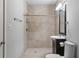 Neutral bathroom featuring a tiled stand up shower, vanity and modern fixtures at 1214 Oglethorpe Ne Ave, Brookhaven, GA 30319