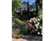 Charming home with inviting front yard with vibrant landscaping and garden at 1214 Oglethorpe Ne Ave, Brookhaven, GA 30319