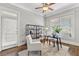 Bright home office with white trim, natural light, neutral furniture, and hardwood floors at 1214 Oglethorpe Ne Ave, Brookhaven, GA 30319