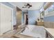 This bathroom features tile flooring, a walk-in shower, and a standalone soaking tub at 1214 Oglethorpe Ne Ave, Brookhaven, GA 30319