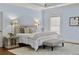 Bright main bedroom with a tufted headboard and a serene atmosphere at 1214 Oglethorpe Ne Ave, Brookhaven, GA 30319