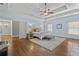 Light-filled main bedroom with a tray ceiling and an ensuite bathroom at 1214 Oglethorpe Ne Ave, Brookhaven, GA 30319