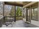 Cozy patio area with dark railings and space to enjoy the outdoors at 1214 Oglethorpe Ne Ave, Brookhaven, GA 30319