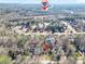 Aerial view of the home near Interstate 20 in a wooded area at 170 Fairview Chase Rd, Covington, GA 30016