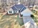 Charming single-story home with well-manicured lawn, landscaping, and a spacious two-car garage at 170 Fairview Chase Rd, Covington, GA 30016