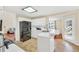 Open kitchen design with white cabinets, stainless steel appliances, and a view of the dining area at 170 Fairview Chase Rd, Covington, GA 30016