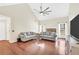 Spacious living room with vaulted ceiling, hardwood floors, and plenty of natural light at 170 Fairview Chase Rd, Covington, GA 30016