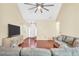 Open concept living room featuring hardwood floors, vaulted ceilings and access to front foyer at 170 Fairview Chase Rd, Covington, GA 30016
