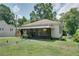Charming home featuring a cozy, screened-in front porch perfect for enjoying the outdoors at 1742 Ware Ave, Atlanta, GA 30344
