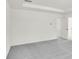 Bedroom with gray carpet, neutral walls, and an open doorway to another room at 202 Groveton Ct, Euharlee, GA 30145