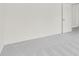 An airy bedroom offers a blank canvas, featuring soft carpeting and ample wall space at 202 Groveton Ct, Euharlee, GA 30145