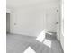 Bright bedroom featuring neutral walls, gray carpet, and an open doorway to closet at 202 Groveton Ct, Euharlee, GA 30145