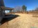 View of backyard and covered patio at 3166 Morris Hills Dr, Dacula, GA 30019