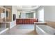 Spacious bathroom with double vanity, soaking tub, glass shower, and ceramic floors at 4240 Agard St, Cumming, GA 30040
