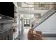 Elegant entryway with staircase, fireplace, and views of the entry and front door at 4240 Agard St, Cumming, GA 30040
