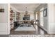 Bright home office with a stylish desk, shelving, and large windows for ample natural light at 4240 Agard St, Cumming, GA 30040