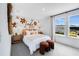 Charming bedroom with a personalized name decal and modern decor, offering a cozy retreat at 227 Groveton Ct, Euharlee, GA 30145
