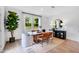Elegant dining room with large windows and stylish décor perfect for gatherings at 227 Groveton Ct, Euharlee, GA 30145