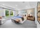 Tranquil main bedroom with natural light, plush bedding, and stylish decor, creating a serene retreat at 227 Groveton Ct, Euharlee, GA 30145