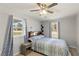 This bedroom features natural light and neutral tones to create a peaceful space at 3384 Nebo Rd, Dallas, GA 30157