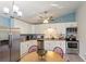 Modern kitchen with stainless steel appliances, white cabinets, and granite countertops at 3384 Nebo Rd, Dallas, GA 30157