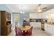 Well-lit kitchen with stainless steel appliances and white cabinetry at 3384 Nebo Rd, Dallas, GA 30157
