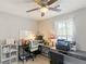 Functional home office space with a desk, chair, and ample storage at 3384 Nebo Rd, Dallas, GA 30157