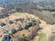 Beautiful neighborhood with mature trees and lush greenery backing onto the golf course at 408 Hickory Fairway Ct, Woodstock, GA 30188
