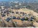 Beautiful neighborhood with mature trees and lush greenery backing onto the golf course at 408 Hickory Fairway Ct, Woodstock, GA 30188