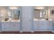Bright bathroom with dual sink vanity and walk in shower at 408 Hickory Fairway Ct, Woodstock, GA 30188