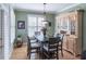 Dining room with hardwood floors and a china cabinet at 408 Hickory Fairway Ct, Woodstock, GA 30188