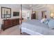 Expansive main bedroom with furniture, neutral walls, a ceiling fan, and an en suite entrance at 408 Hickory Fairway Ct, Woodstock, GA 30188