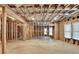 Unfinished basement with exposed framework and insulation, offering potential for customization at 641 Freeman Brock Rd, Auburn, GA 30011