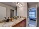 Bathroom featuring double sinks, granite counters, and vanity at 641 Freeman Brock Rd, Auburn, GA 30011