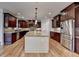 Kitchen featuring custom cabinets, granite countertops, and stainless steel appliances at 641 Freeman Brock Rd, Auburn, GA 30011