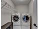 Laundry room featuring a front loading washer and dryer in a modern home at 641 Freeman Brock Rd, Auburn, GA 30011