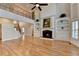 Bright and airy living room boasts a fireplace and staircase at 641 Freeman Brock Rd, Auburn, GA 30011