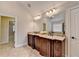 Beautiful main bathroom with granite counters, dual sinks, and ample space for a serene experience at 641 Freeman Brock Rd, Auburn, GA 30011