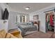 Bright bedroom with large window offering city views and a convenient sliding door closet at 2479 Peachtree Ne Rd # 508, Atlanta, GA 30305