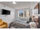 Bedroom features natural light from large window, carpet, and a cozy yellow chair at 2479 Peachtree Ne Rd # 508, Atlanta, GA 30305
