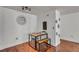 Bright dining area with hardwood floors and modern table and bench set at 2479 Peachtree Ne Rd # 508, Atlanta, GA 30305