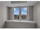 Window with a beautiful view of the city and blue skies at 2479 Peachtree Ne Rd # 508, Atlanta, GA 30305
