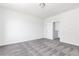 Bedroom with neutral carpet and a doorway to walk-in closet at 2715 Stream Valley Lane Nw Nw Cir, Atlanta, GA 30318